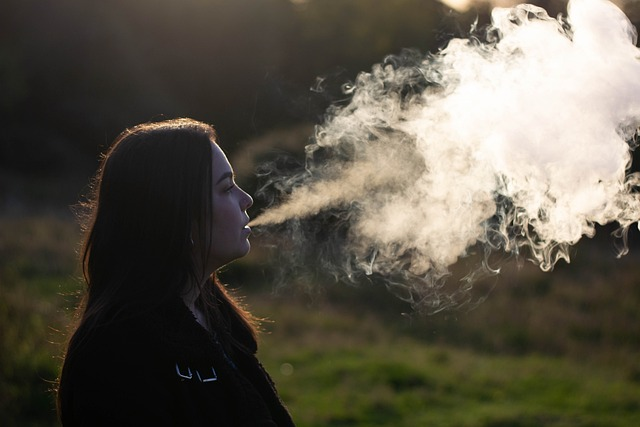 a woman smoking vape